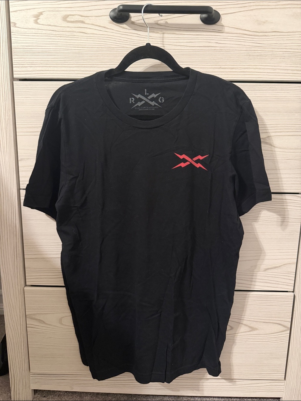 Black Short-Sleeve Crewneck T‑Shirt with Red Chest Accent